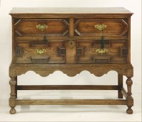 Lot 1458 - A George III style chest of two geometrically moulded drawers