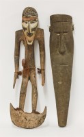 Lot 1117 - A West African carved wooden standing figure