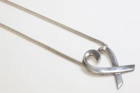 Lot 1024 - A sterling silver heart pendant