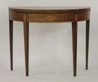 Lot 1374 - A George III mahogany and satin wood fold over card table