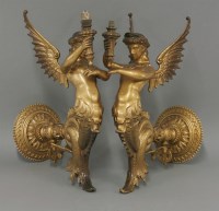 Lot 1200 - A pair of Victorian cast wall light brackets