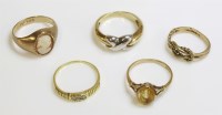 Lot 1047 - Four 9ct gold rings