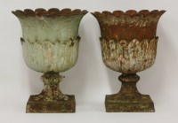 Lot 1343 - A pair of Victorian cast iron urns