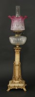 Lot 1201 - A brass and alabaster column oil lamp