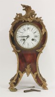 Lot 1250 - A French tortoiseshell and gilt metal mantel clock