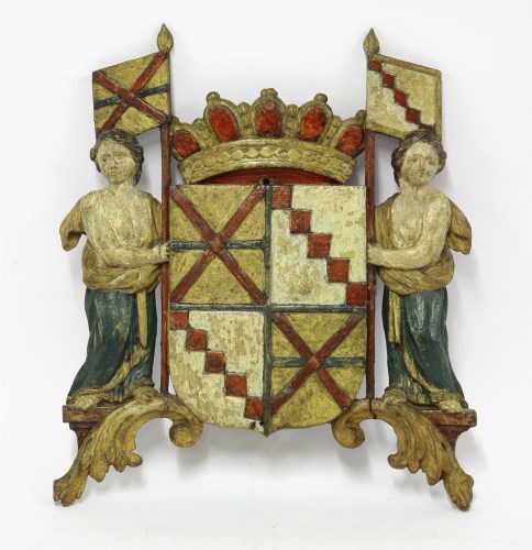 Lot 91 - A carved and polychrome coat of arms