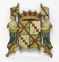 Lot 91 - A carved and polychrome coat of arms