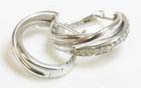 Lot 1005 - A pair of Continental white gold diamond set hoop earrings