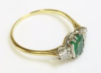 Lot 1008 - A green doublet and diamond three stone ring