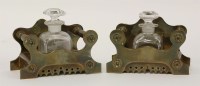 Lot 1138 - A pair of Victorian brass inkwells