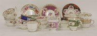 Lot 1073 - Two tea cups and saucers