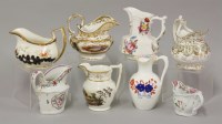 Lot 1083 - Eight hand painted English porcelain cream jugs