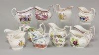 Lot 1084 - Twelve English cream jugs