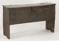 Lot 1413 - An 18th century oak blanket box