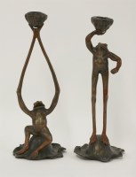 Lot 1215 - Two Art Nouveau French bronzed candlesticks