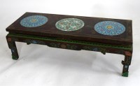 Lot 682 - A Chinese low rectangular red lacquer table