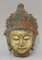 Lot 192 - An attractive iron Head of Guanyin