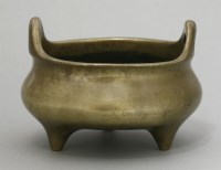 Lot 589 - A bronze incense burner