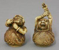 Lot 469 - A rare and fine pair of ivory Netsuke