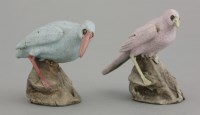 Lot 628 - An unsual pair of Guangdong stoneware birds