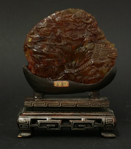 Lot 146 - A large and rare amber Carving