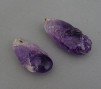 Lot 585 - Two amethyst pendants