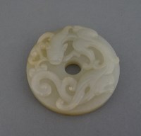 Lot 605 - A jade Disc