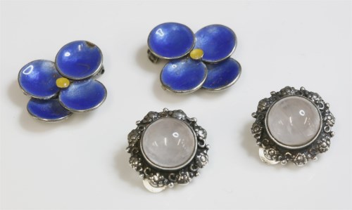 Lot 22 - A pair of blue and yellow enamel flower head earrings