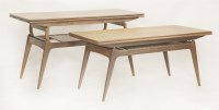 Lot 621 - A pair of Danish teak metamorphic tables