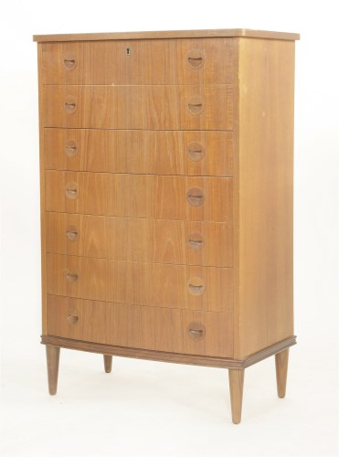 Lot 626 - A Danish teak chest of seven drawers