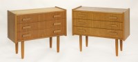Lot 628 - A pair of Danish teak three-drawer bedside cupboards