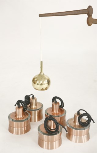 Lot 632 - A set of five copper effect and enamelled ceiling lights