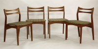 Lot 633 - A set of four teak dining chairs