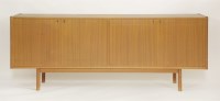 Lot 639 - A Danish teak long sideboard