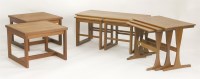 Lot 641 - A nest of teak coffee tables