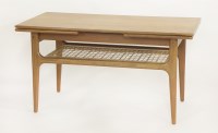 Lot 652 - A Danish teak draw-leaf coffee table