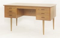 Lot 656 - A teak desk
