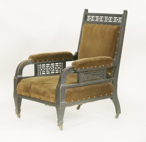 Lot 64 - An Aesthetic ebonised armchair