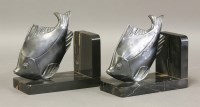 Lot 255 - A pair of Art Deco marble and patinated metal bookends
