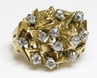 Lot 29 - A diamond set bombé form modernist dress ring