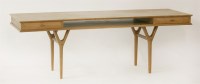 Lot 596 - A Danish teak long coffee table