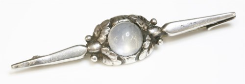 Lot 6 - A silver moonstone bar brooch