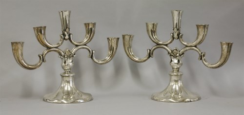 Lot 108 - A pair of Continental silver-plated candelabra