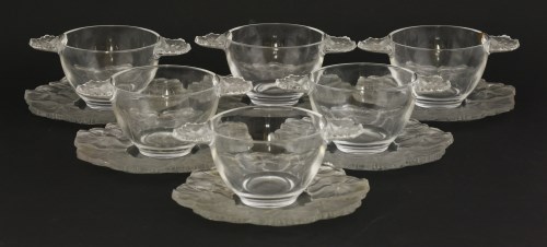 Lot 125 - A set of six Lalique clear and opaque glass fruit bowls and saucers