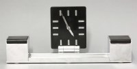 Lot 190 - An Art Deco chrome and Bakelite desk clock