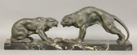 Lot 204 - An Art Deco spelter and marble group of lions