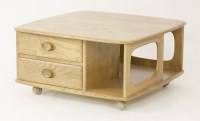 Lot 594 - An Ercol 'Pandora's Box' coffee table