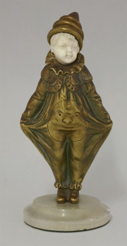 Lot 215 - A figure of a young boy dressed as a clown