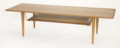 Lot 678 - A Danish teak long coffee table