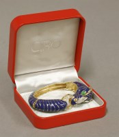 Lot 2 - A gold-plated paste and enamel zebra bangle